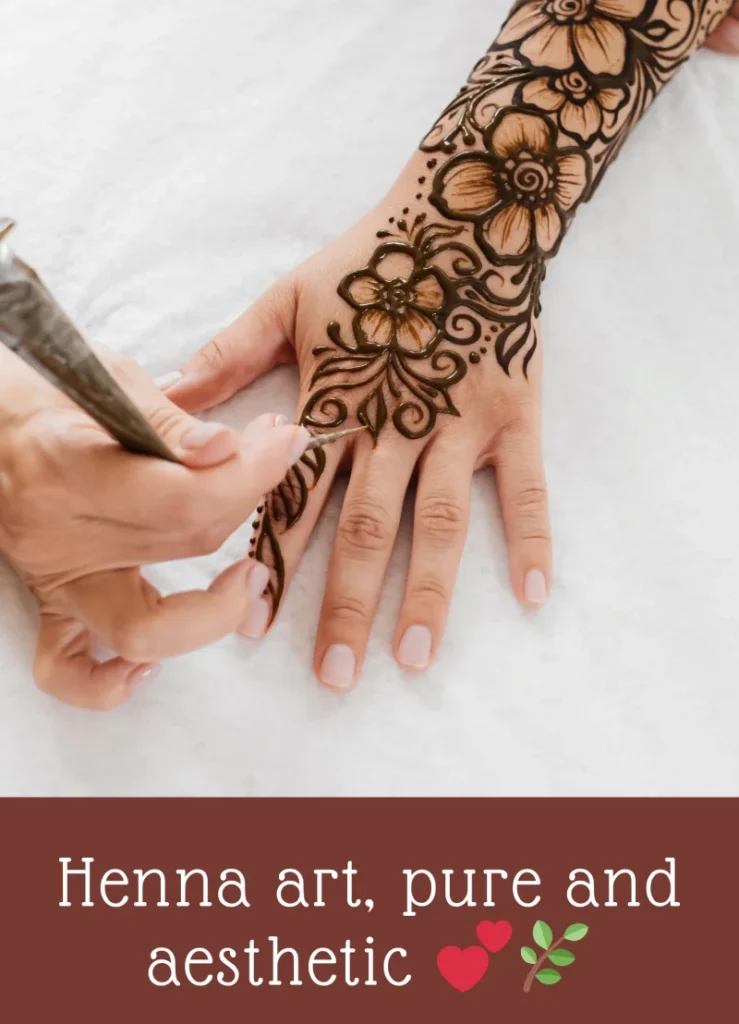 350+ Perfect Mehndi Captions for Instagram with Emojis 17 Hand with minimalist, delicate mehndi designs, conveying elegance, with the caption 'Minimal mehndi, maximum elegance. β¨'.