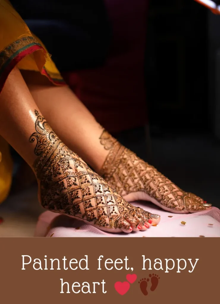 350+ Perfect Mehndi Captions for Instagram with Emojis 23 Close-up of feet with intricate mehndi designs, conveying happiness and a new journey, with the caption 'Stepping into happiness with hennaed feet!