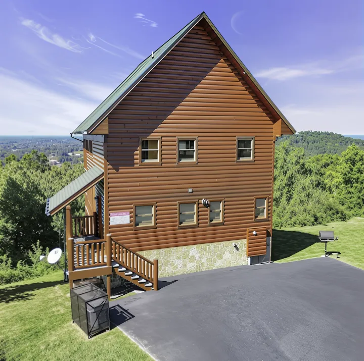 Affordable and Cosy Cabins in Pigeon Forge You’ll Love 4 Modern log-style vacation rental from Outrageous Cabins in Pigeon Forge with mountain views.