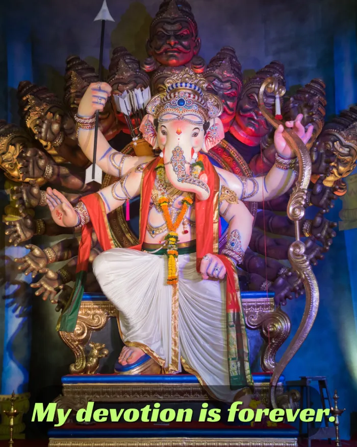 250+ Heartfelt Ganesh Captions for Instagram: Devotion, Joy & Blessings 15 A Majestic Multi-Armed Lord Ganesh Idol Holding Various Symbolic Items, With The Text &Quot;My Devotion Is Forever.&Quot;
