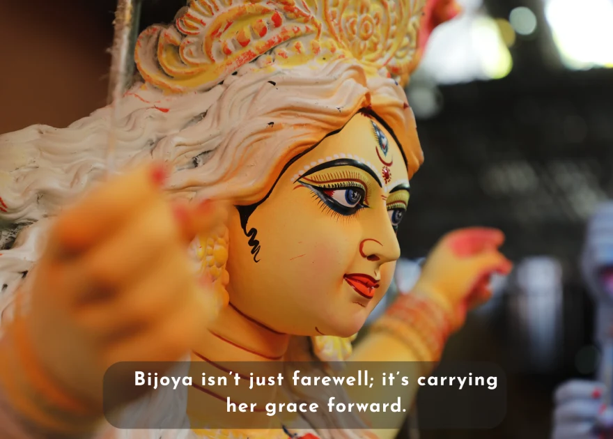 Best Durga Puja Captions, Wishes and Quotes for Social Media 6 A Softly Lit, Close-Up Of Goddess Durga'S Face With The Text &Quot;Bijoya Isn'T Just Farewell; It'S Carrying Her Grace Forward.&Quot;