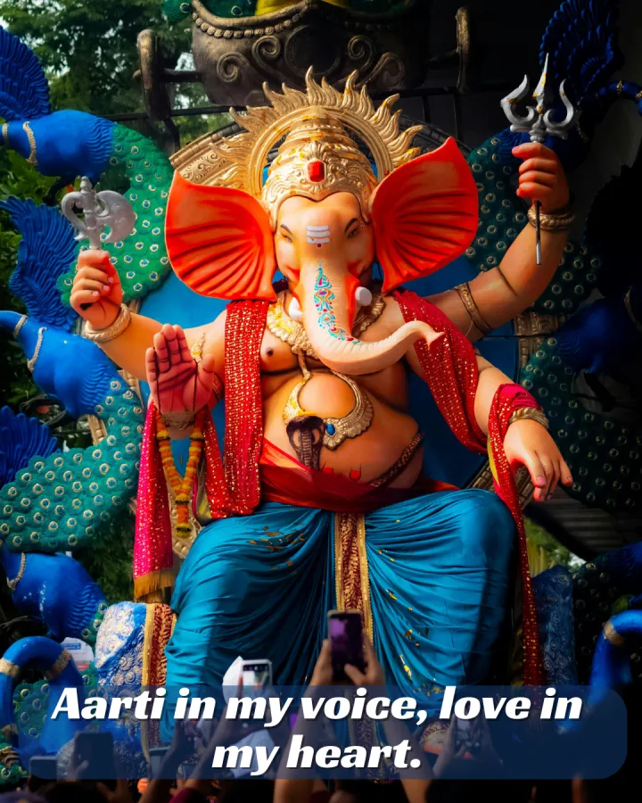 250+ Heartfelt Ganesh Captions for Instagram: Devotion, Joy & Blessings 7 A Colorful Statue Of Lord Ganesh Sits On A Throne Adorned With Peacocks, With The Words &Quot;Aarti In My Voice, Love In My Heart.&Quot;