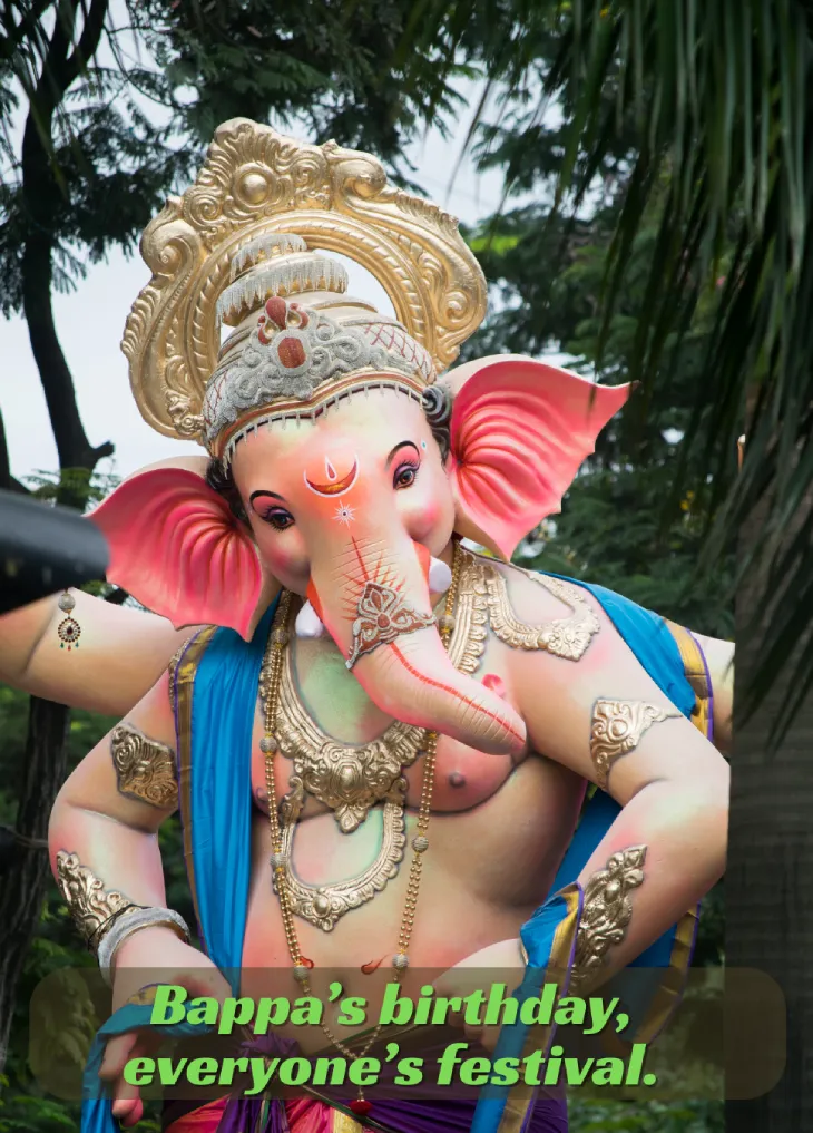 250+ Heartfelt Ganesh Captions for Instagram: Devotion, Joy & Blessings 10 A Smiling Lord Ganesh Idol, Decorated And Surrounded By Foliage.
