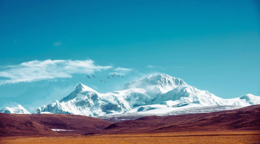 When Is the Best Time of Year to Travel Globally? 11 Snow-Capped Himalayan Mountains Under A Clear Blue Sky.